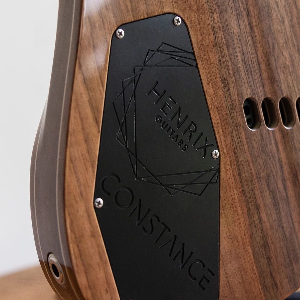 constance 6 string headless guitar electronic cavity close up