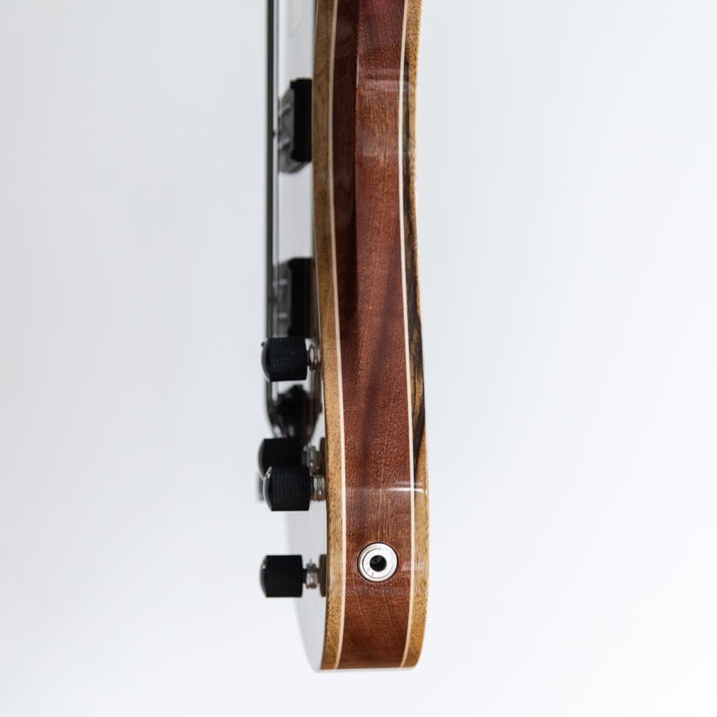 constance 4 string headless bass side closeup