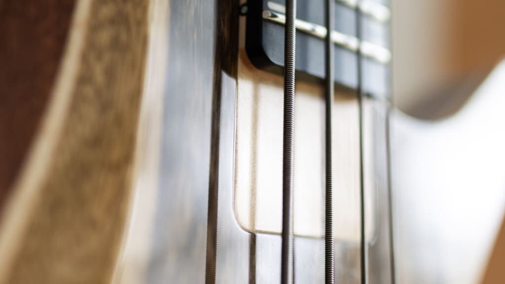 constance 4 string headless bass neck joint closeup