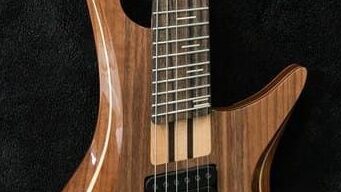 constance 6 string headless guitar neckjoint closeup