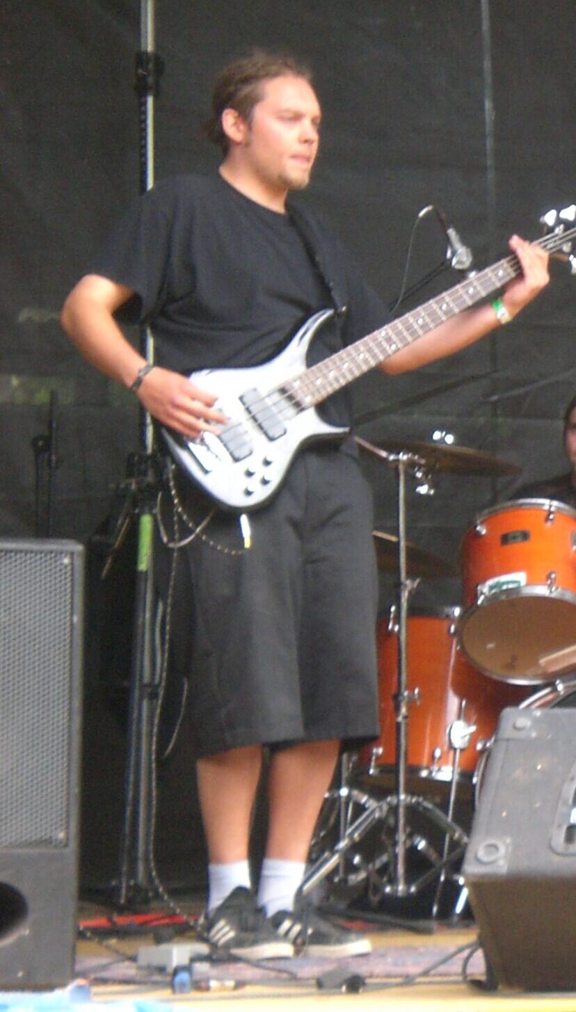 young henrik playing bass